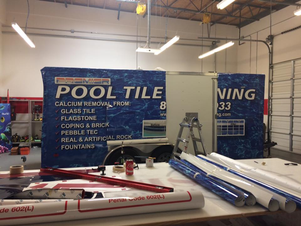 Process of applying a vehicle wrap - Custom acrylic lobby signs Fontana, Rancho, Jurupa, Riverside and Eastvale